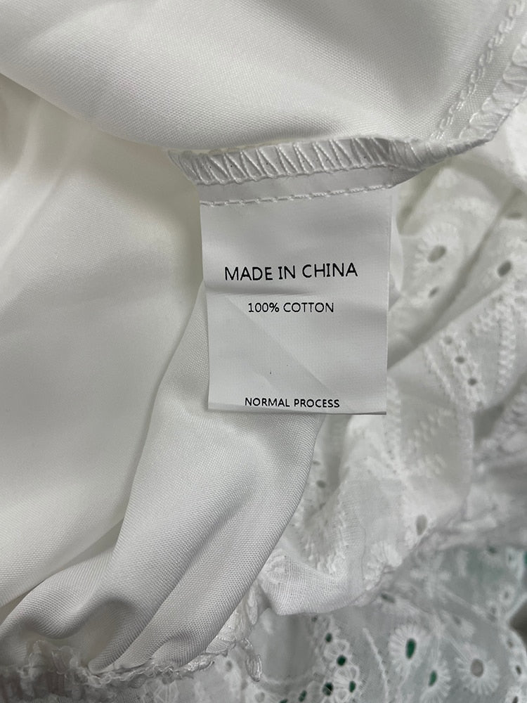 Cotton lace up hollow out summer white Holiday casual high waist ruffled mini dresses A-line frills Dress The Clothing Company Sydney