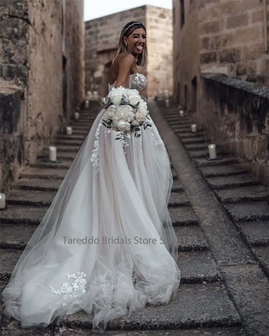 Customized Strapless Wedding Dress Featuring Stunning Crystals Lace Appliques and Flowy  Silhouette Bridal Dress The Clothing Company Sydney